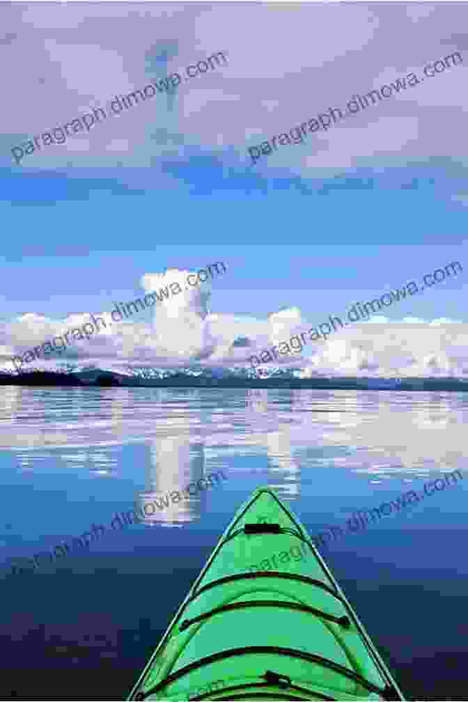 A Kayak Glides Effortlessly Through Tranquil Waters, Surrounded By Lush Greenery. Basic Illustrated Kayaking (Basic Illustrated Series)