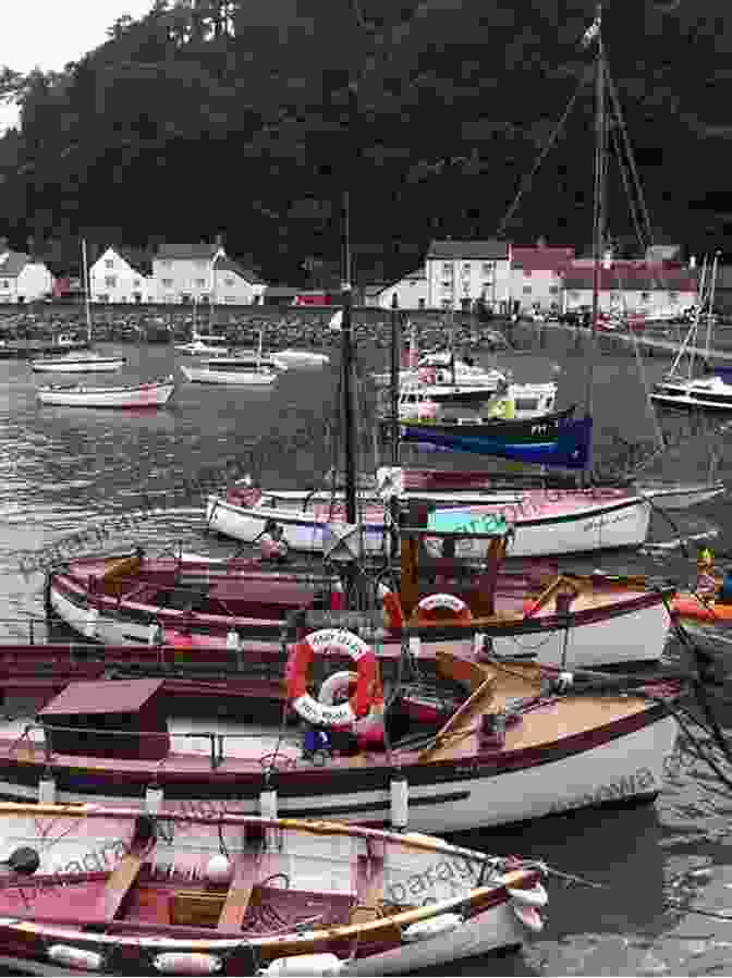 The Vibrant Harbor Of Minehead, Filled With Colorful Boats And Offering Stunning Views Of North Hill. A Leisurely Guide To The South West Coast Path: Minehead To Westward Ho : The Secrets And History Of The Picturesque Fishing Villages And Dramatic Coastline Of North Devon Somerset And Lundy Island